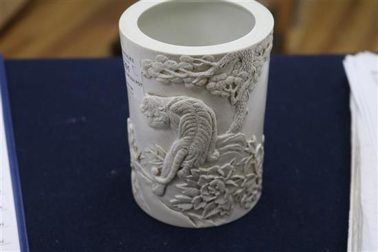 A Chinese biscuit porcelain brush pot, seal mark Wang Binrong, 5in.